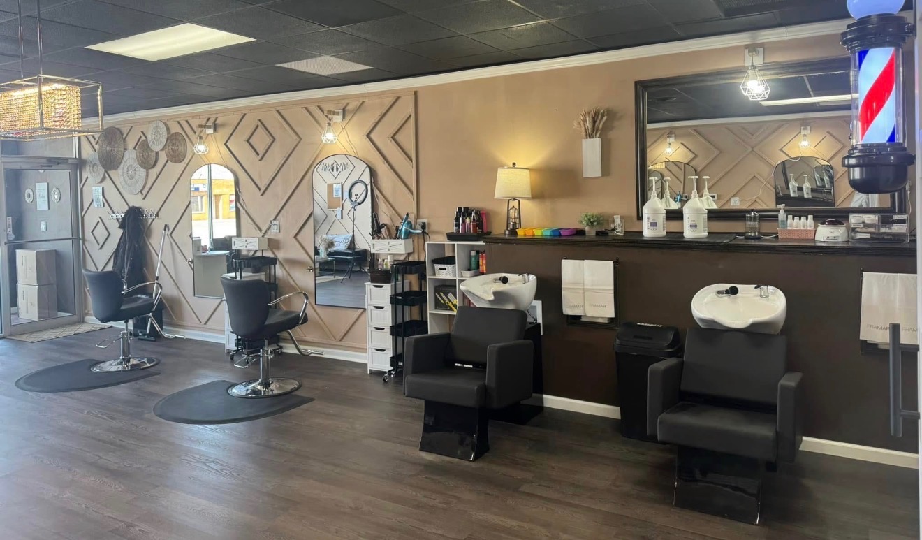Gorgeous Mane salon interior with styling station and warm lighting