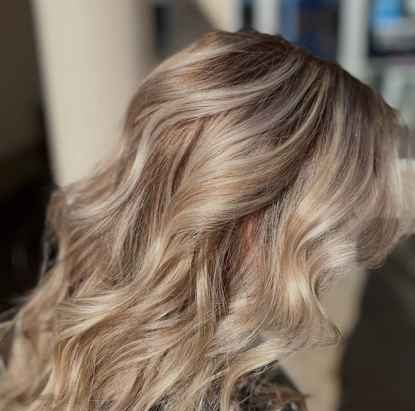Warm blonde balayage with natural root shadow